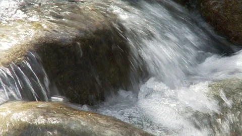 Stream, running water, waterfall, rocks, river bed Stock Footage 125747188