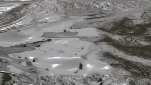 A stream of rushing water Stock Footage 130837980