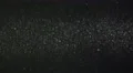 The stream of a smoke on the background of particle. Slow motion capture 4k or 4k+ Resolution