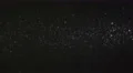 The stream of a smoke on the background of particle. Slow motion capture 4k or 4k+ Resolution