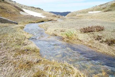 Stream from snow melt Stock Photos