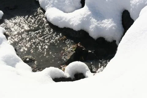 Stream in the snow Stock Photos