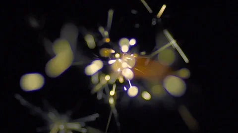The stream of spark on the black background. Real time capture Stock Footage 71199344
