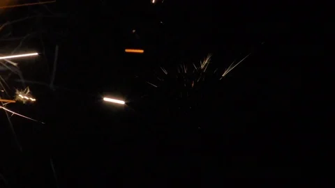 The stream of sparks on the black background. slow motion Stock Footage 80985778