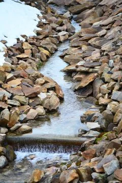 Stream in the stone mountains Stock Photos