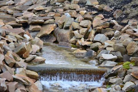 Stream in the stone mountains Stock Photos