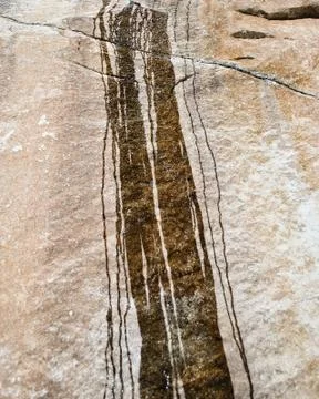 Stream on the stone Stock Photos