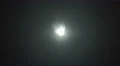 The stream of thick smoke against the background of bright light. Slow motion 4k or 4k+ Resolution