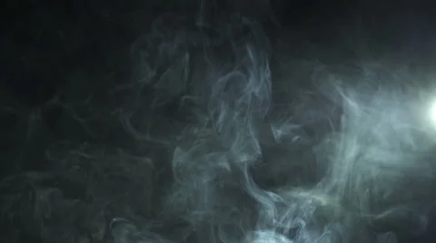 The stream of thick smoke on the background of dark surface. Slow motion capture Stock Footage 67269303