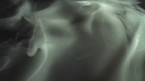 The stream of thick smoke on the background of dark surface. Slow motion capture Stock Footage 67269572