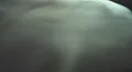 The stream of thick smoke on the background of dark surface. Slow motion capture 4k or 4k+ Resolution