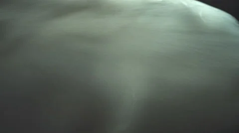 The stream of thick smoke on the background of dark surface. Slow motion capture Stock Footage 67269691