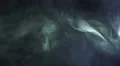 The stream of thick smoke on a dark background. Slow motion capture 4k or 4k+ Resolution