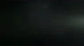 The stream of thick smoke on a dark background. Slow motion capture 4k or 4k+ Resolution