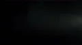 The stream of thick smoke on a dark background. Slow motion capture 4k or 4k+ Resolution