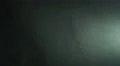 The stream of thick smoke on a dark background. Slow motion capture 4k or 4k+ Resolution