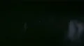 The stream of thick smoke on a dark background. Slow motion capture 4k or 4k+ Resolution