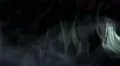 The stream of thick smoke on a dark background. Slow motion capture 4k or 4k+ Resolution