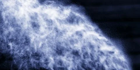 A stream of water and a cloud of drops Stock Photos