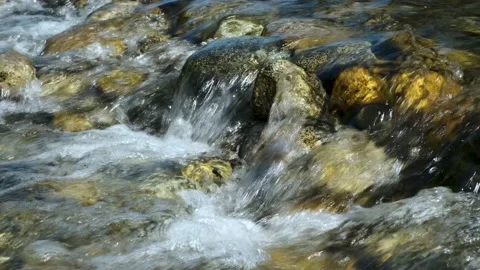 Stream of water and rocky bottom of the river. Stock Footage 166186035
