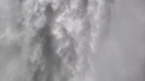 Stream of water falling down on centre of waterfall Stock Footage 37577415