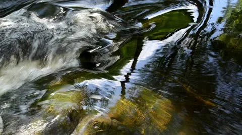Stream water flow rocks and retro stone wall building bridge Stock Footage 22034741
