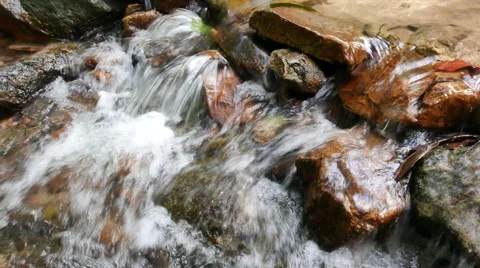 Stream water flow at waterfall Stock Footage 57312783
