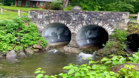 Stream Water Flowing Through Stone Bridge Culverts Stock Footage 344329251