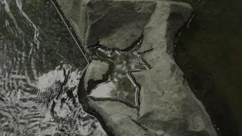 Stream Water Flowing Through Unique Rock Formation - Nature's Path 스톡 동영상 310568277