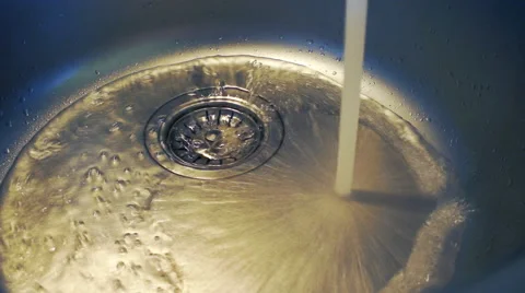 Stream of water flows from the tap in the sink with sound Stock Footage 48388188