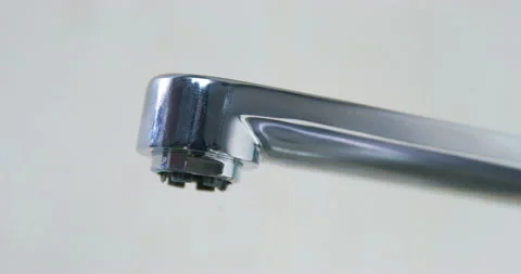 Stream of water flows through broken faucet above sink Stock Footage 236338528
