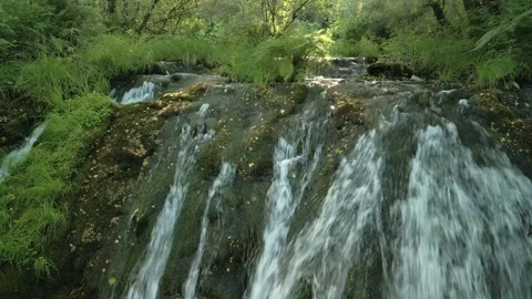 Stream of Water Gushing At Parga Waterfall In Forest Stock Footage 284716361