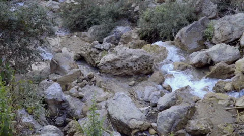 Stream of water in mountains Stock Footage 58485387