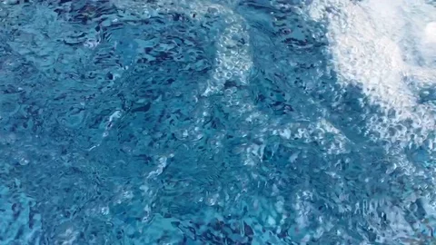 Stream of water pouring into pool Stock Footage 89886763