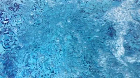 Stream of water pouring into pool Stock Footage 89886774