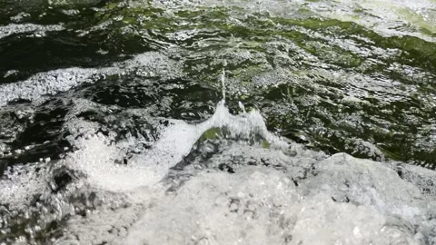 Stream water into the river. -footage Stock Footage 150427771