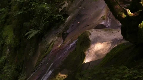 Stream of water running over rocks Stock Footage 7752904