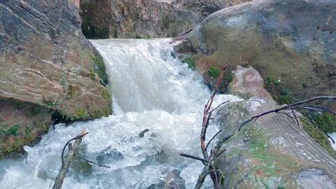 Stream water rushing through mossy rocks Stock Footage 252243096