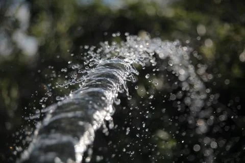 The stream of water in slow motion Stock Photos