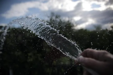 The stream of water in slow motion Stock Photos