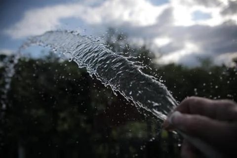 The stream of water in slow motion Stock Photos