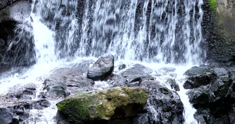 Stream waterfall between rocks Vidéo 137144708