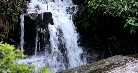 Stream waterfall between rocks 스톡 동영상 137144732