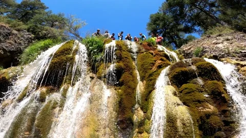 Stream waterfalls in Sierra de Cazorla, Spain.  Water falls over rocks. Видео 135071786