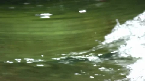 Stream wave closeup pull out Stock Footage 8520639