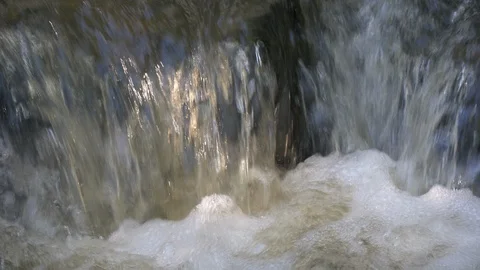 Stream in the woods with small waterfall - close-up 4K Stock Footage 95749486