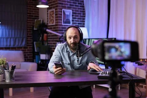 Streamer doing q&amp;a live broadcast Stock Photos