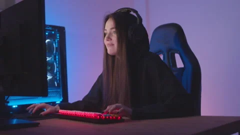 Streamer girl playing a computer game Stock Footage 197418807
