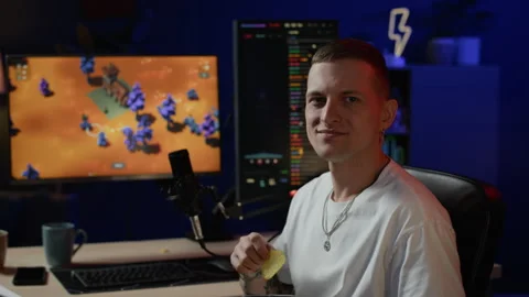 Streamer Turning to Camera Slowly Stock Footage 332730496