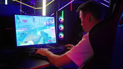 Streamer winning the round of the modern battle royale computer digital game Stock Footage 249382372